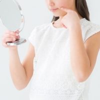 口内炎に悩んでる女性